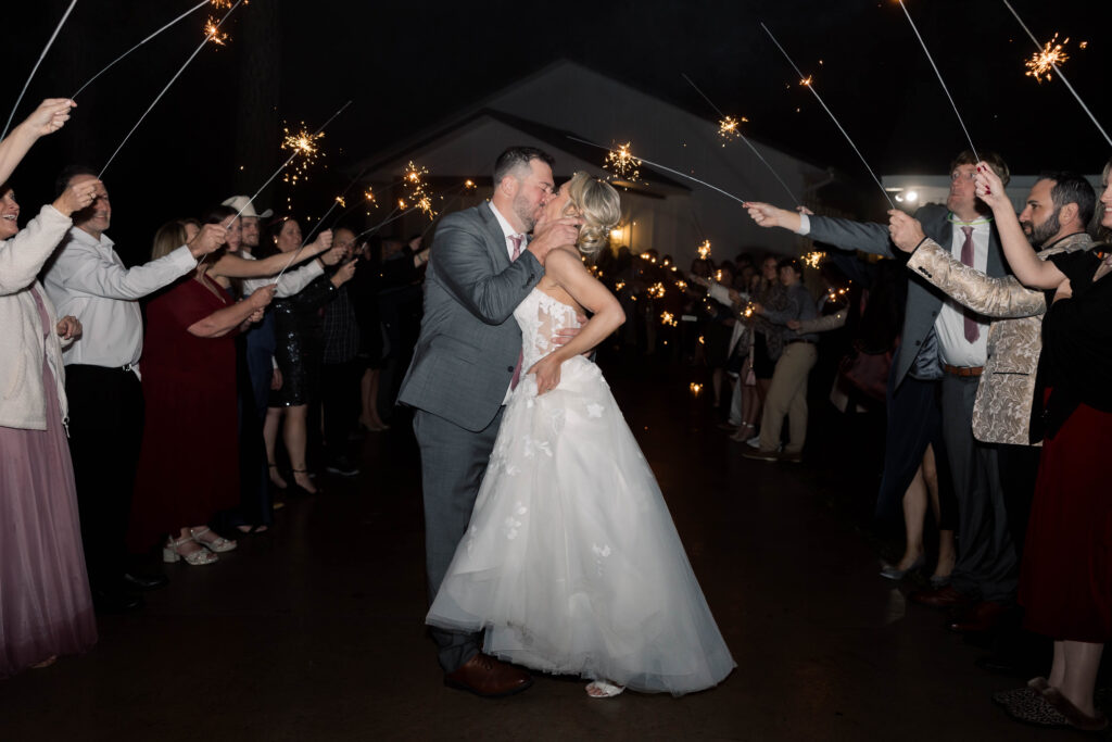 heron hill wedding | sparkler exit with bride and groom kissing