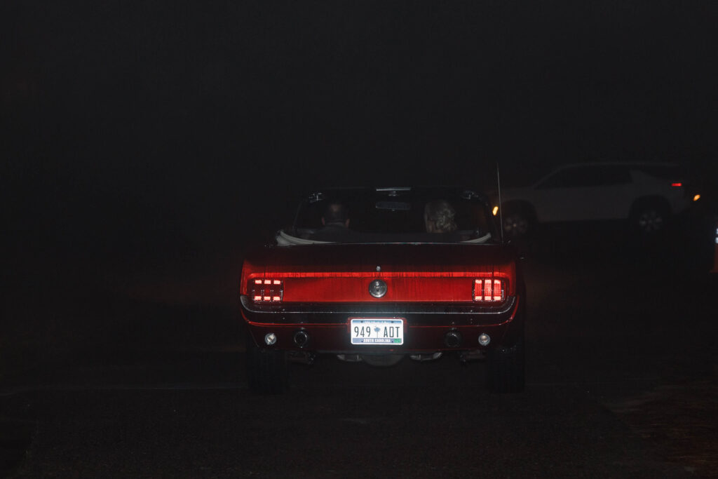 heron hill wedding | classic red mustang with bride and groom driving away