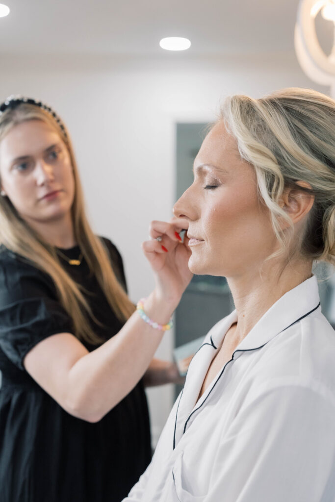 heron hill wedding | bride getting makeup applied on wedding day