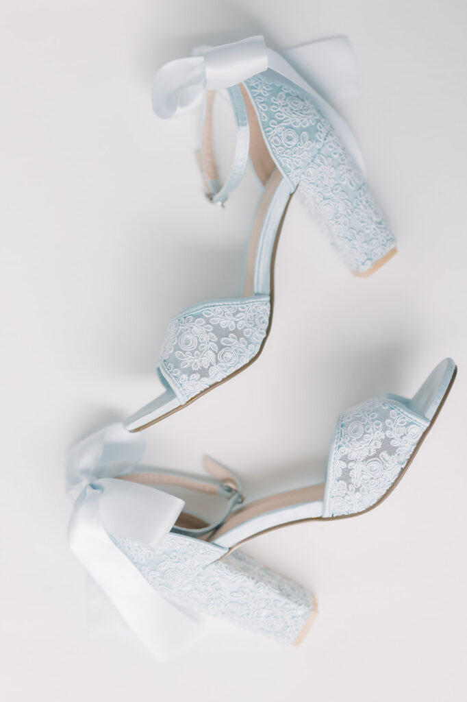 fine art wedding photographer wedding bridal shoes in the color light blue