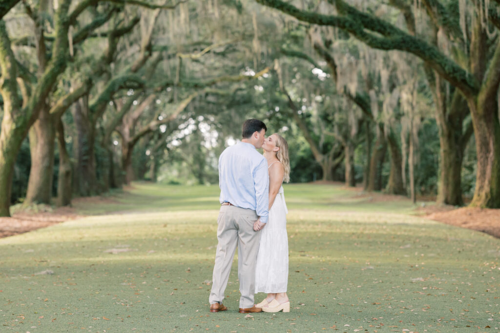 Engagement Photo Ideas in Charleston SC Magnolia place couple kissing