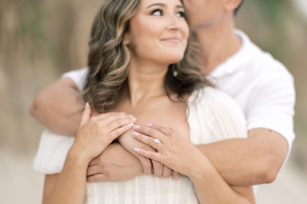 Wedding photographer south carolina | couple holding each other with hands in focus