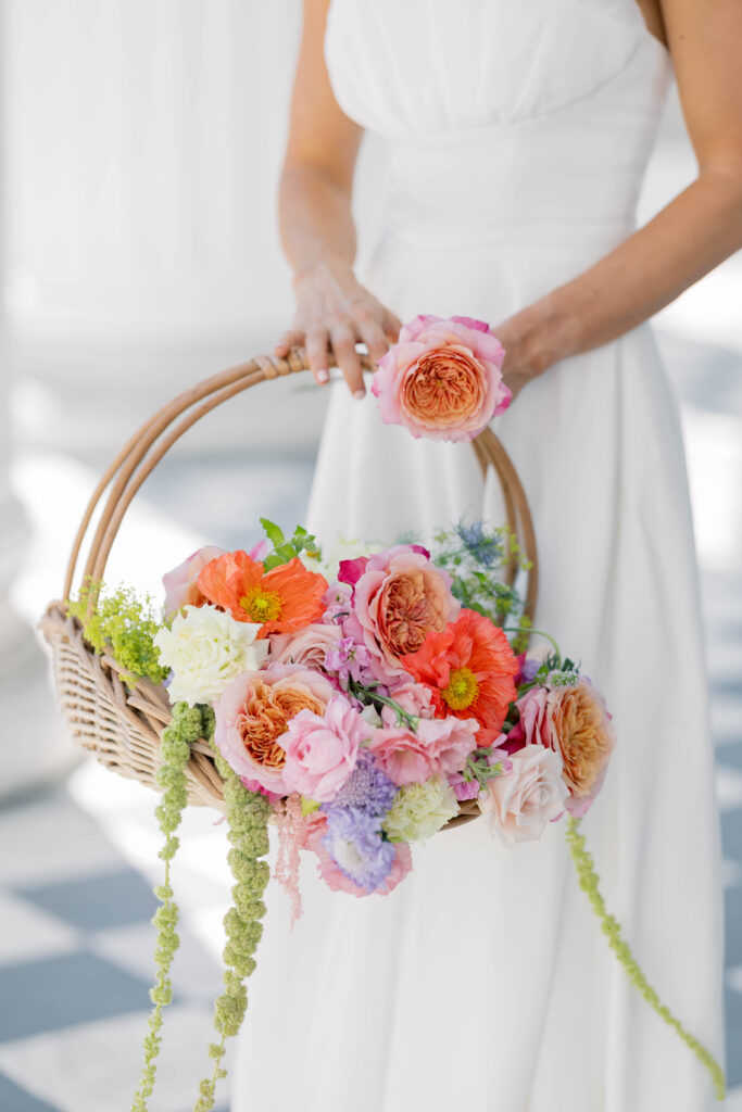 light and airy wedding photography  basket of wedding florals