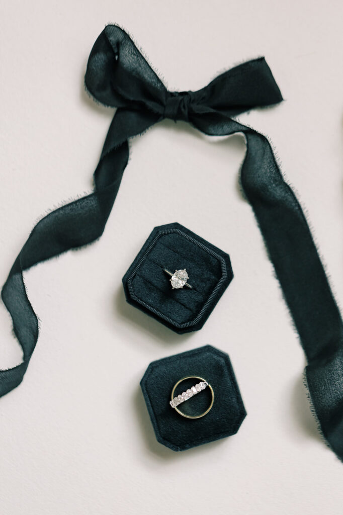 fine art wedding photographer ribbon with rings and black ring box