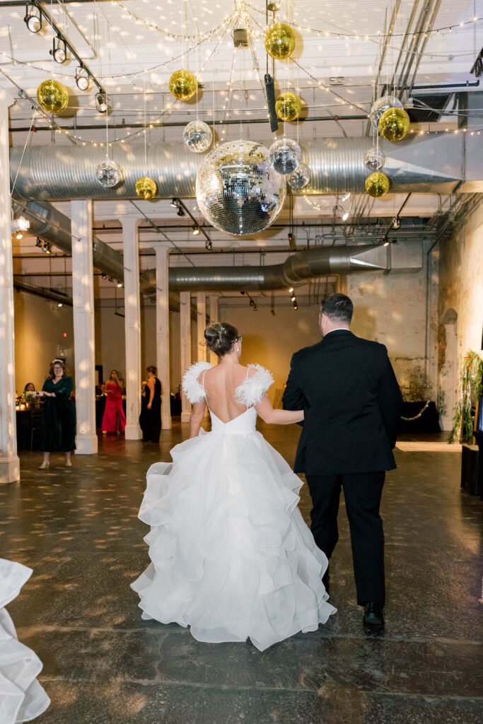 Columbia South Carolina wedding photographer | couple under the disco balls on new years eve wedding at 701 whaley