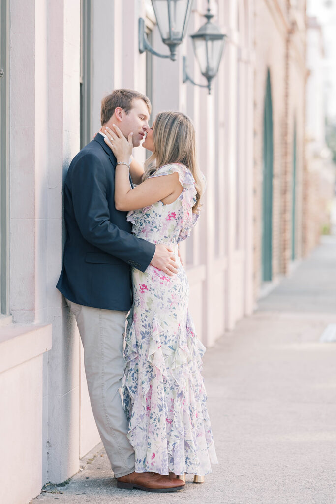 Charleston SC engagement photos | couple kissing on king street