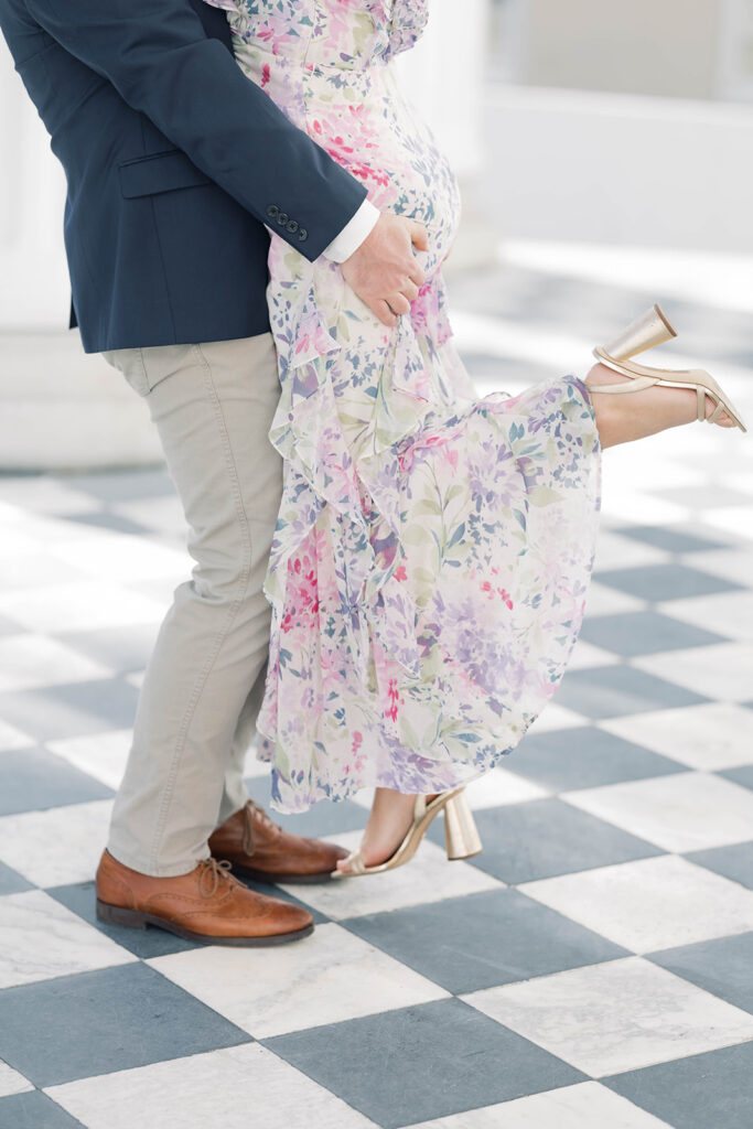 Engagement photos near me | guy picking up girl on iconic charleston street