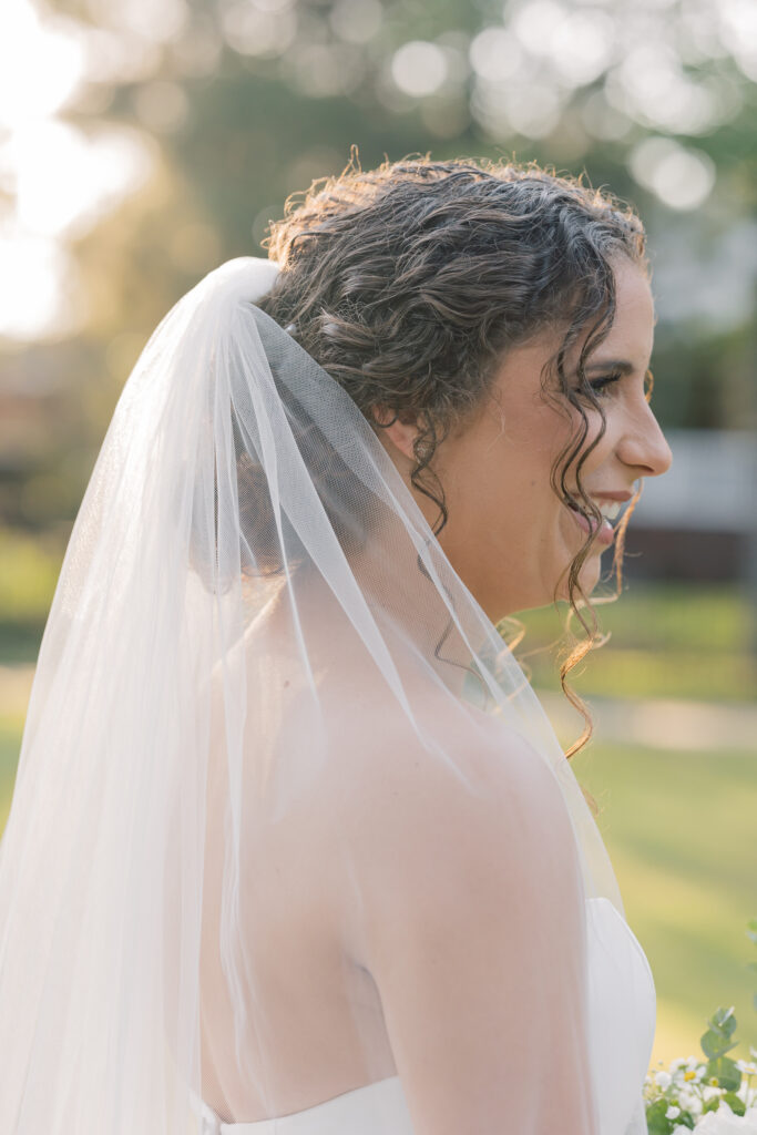  Bridal Portraits | bride looking away with long veil