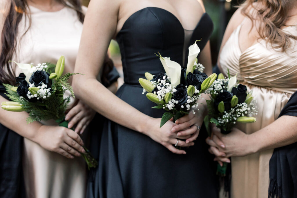 south carolina photographer |  Bride in black dress holding lilies and black roses