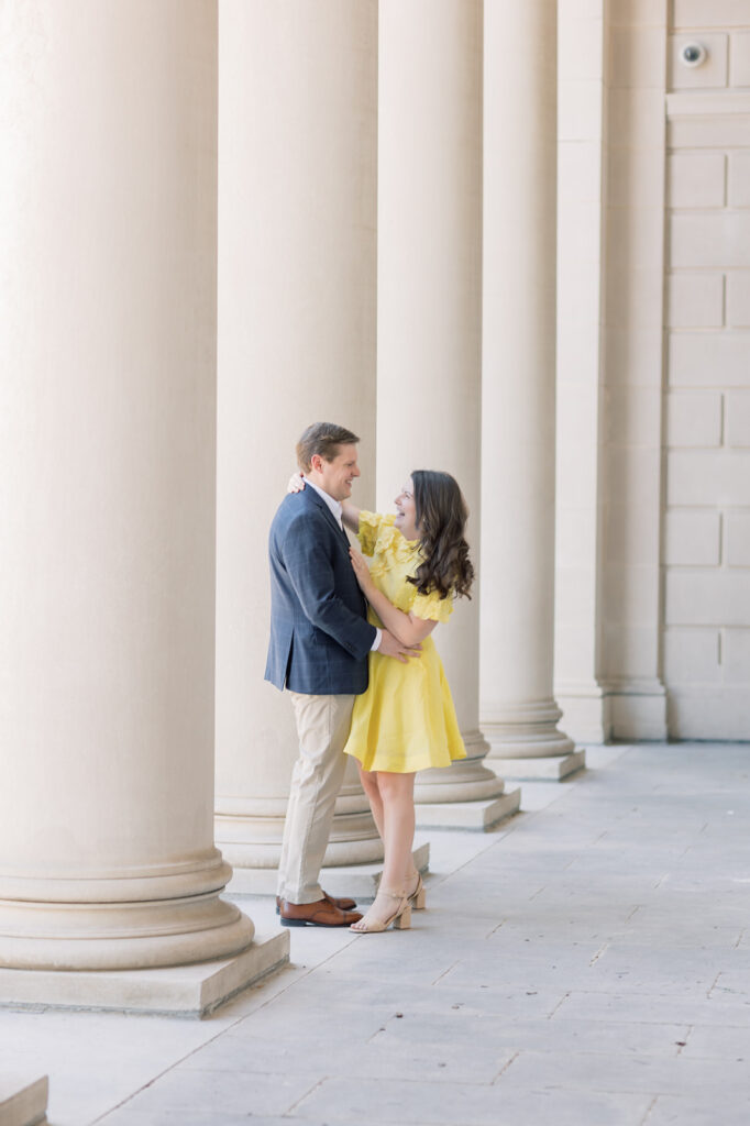 Engagement photographer near me | couple smiling at south carolina statehouse