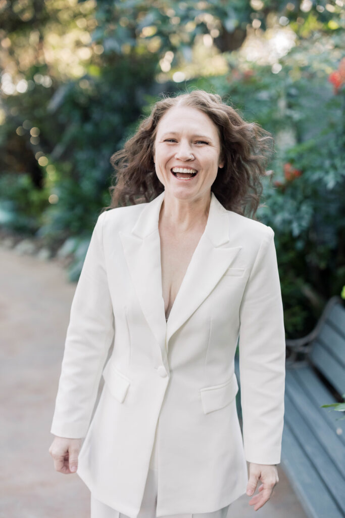 south carolina photographer | laughing bride in white suit