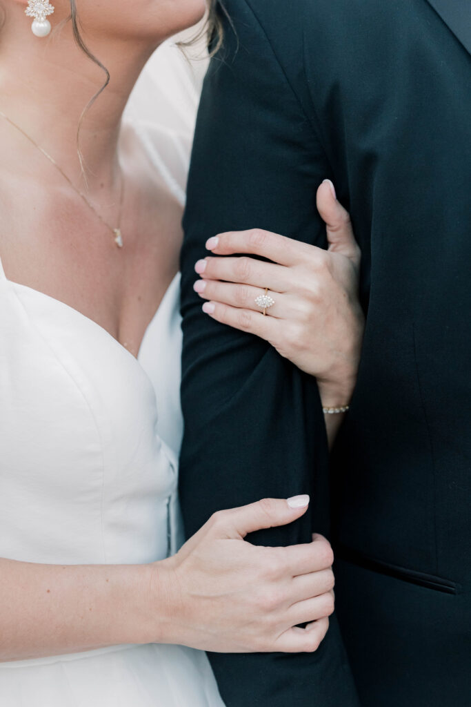 Columbia South Carolina wedding photographer | bride and groom close up of hands at the university of south carolina horseshoe