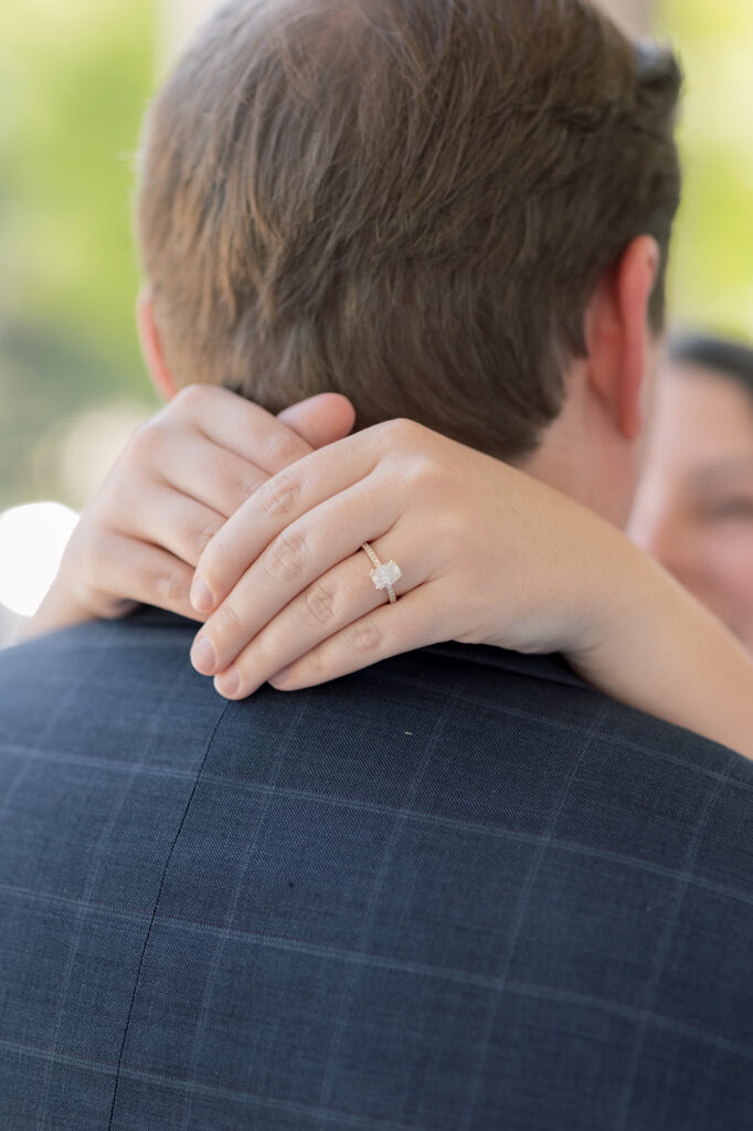 Engagement photos near me | hands with engagement ring 