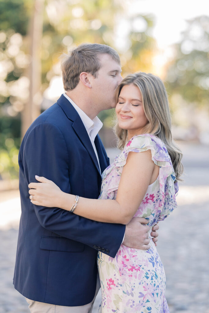 Charleston SC engagement photos | couple on the cobblestone chalmers street