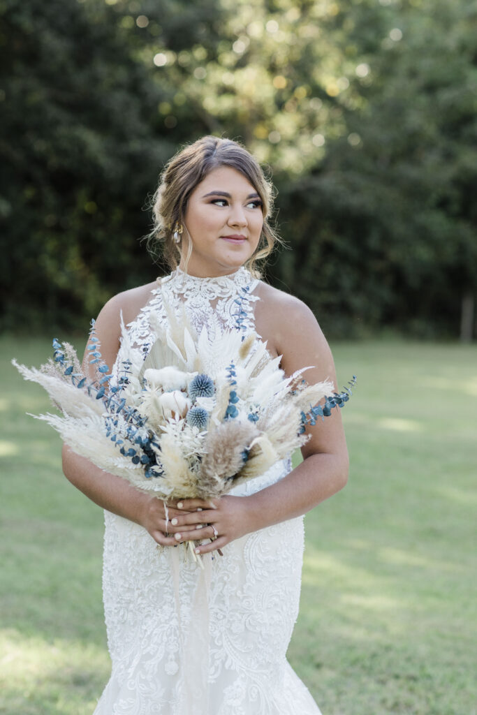 Bridal Portraits | Bride looking away. Warm summer day in Charleston, SC.