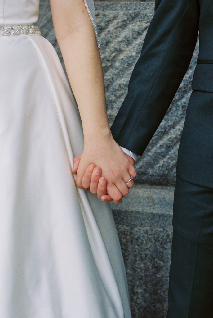 Top Film Photographers in South Carolina for Your Wedding | Couple holding hands after wedding in Columbia, SC. Photographed in 35mm color fuji 400 film.