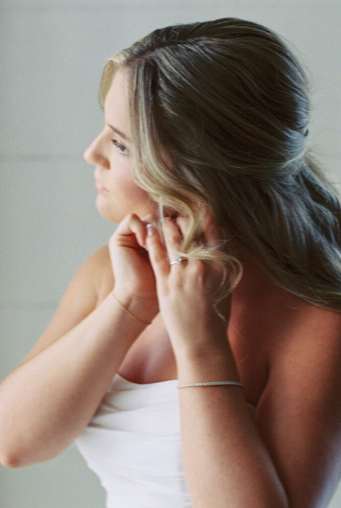  Film Photography | Intimate photo of bride and groom after wedding ceremony in Charleston, SC. Photographed in 35mm color fujifilm 400.