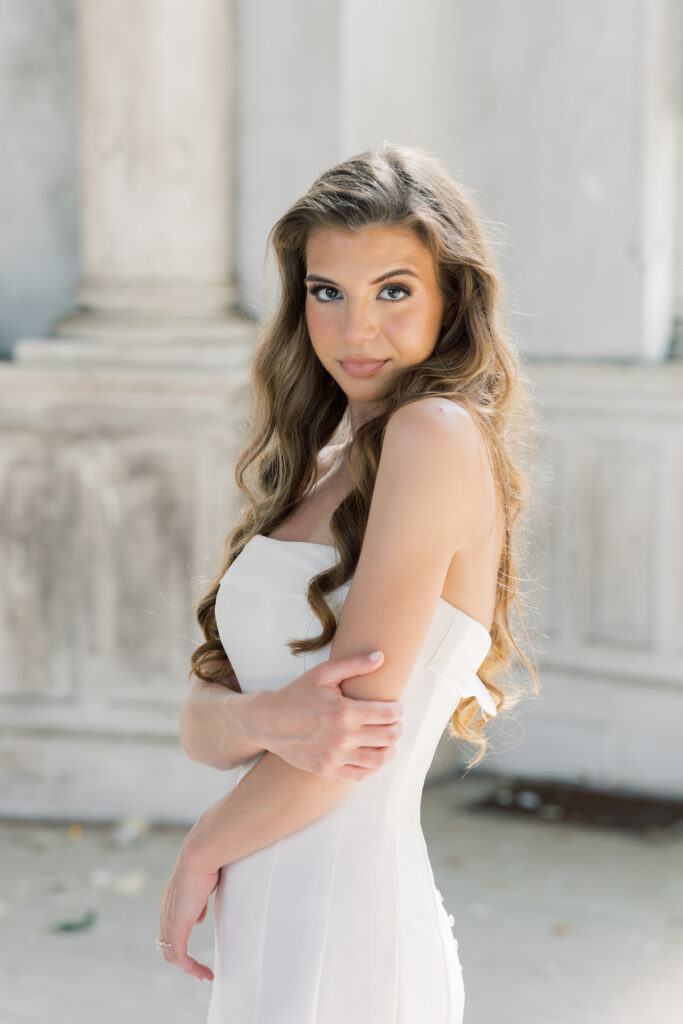 Best bridal portrait locations | Bridal portraits of bride in strapless dress in Charleston, SC. Bride looking at camera with a slight smile.