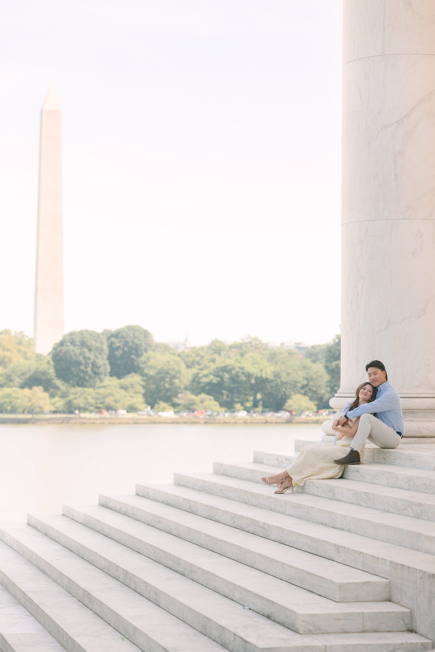 DC Engagement Photographer | Engagement session in Washington, DC | couple holding each other in front of the Thomas Jefferson Memorial