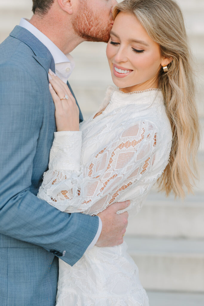 DC Engagement Photo | Engagement Session in Washington DC | Man kissing woman in front of the Lincoln Memorial Steps
