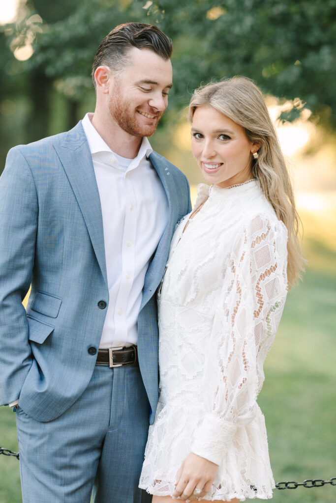 DC engagement photo locations | Couple in Washington DC | Man looking at woman near reflecting pool at Lincoln Memorial 