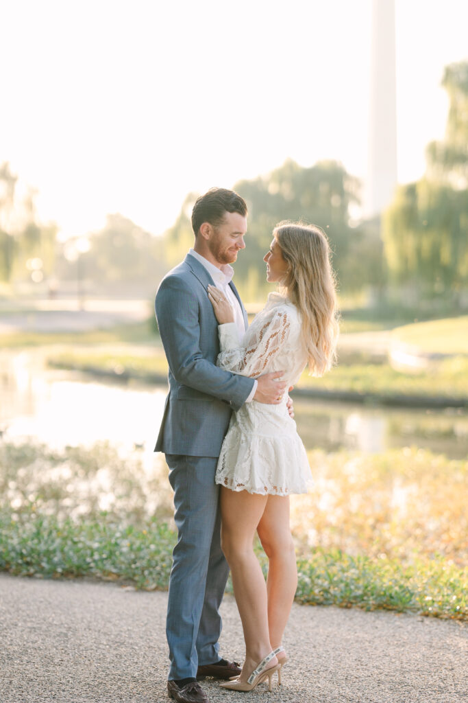 DC Engagement Photo | Couple looking at each other at sunrise in Washington DC