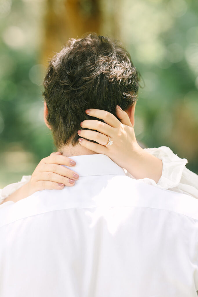 Charleston engagement photographers | Engagement session in Charleston SC | hand with engagement ring in mans hair