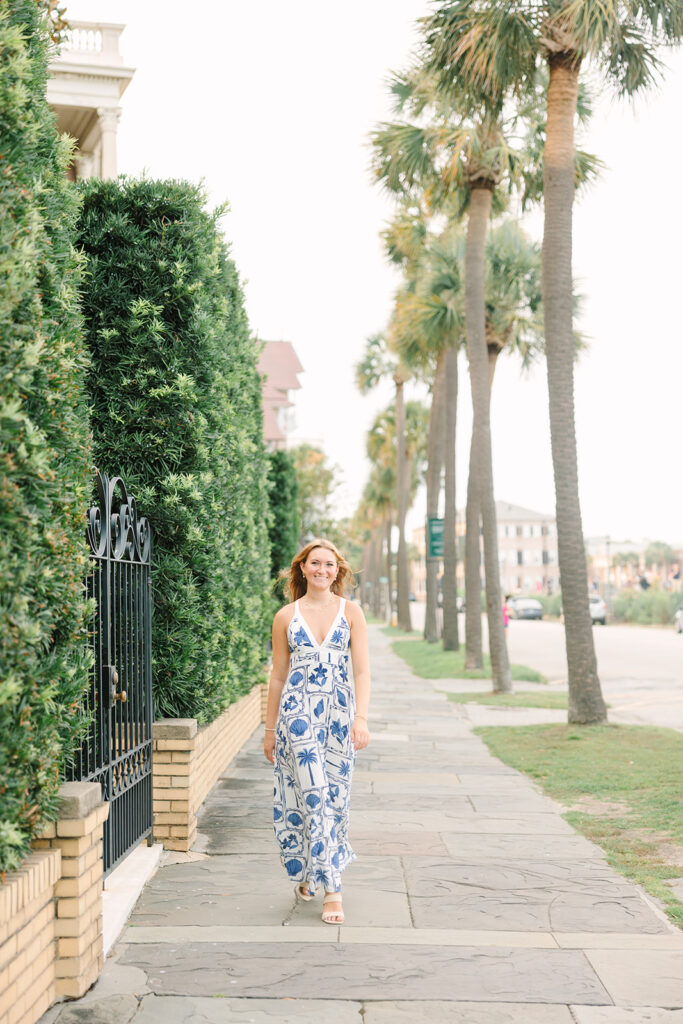 Charleston senior pictures | Senior session in Charleston SC | Senior walking and smiling at the camera 