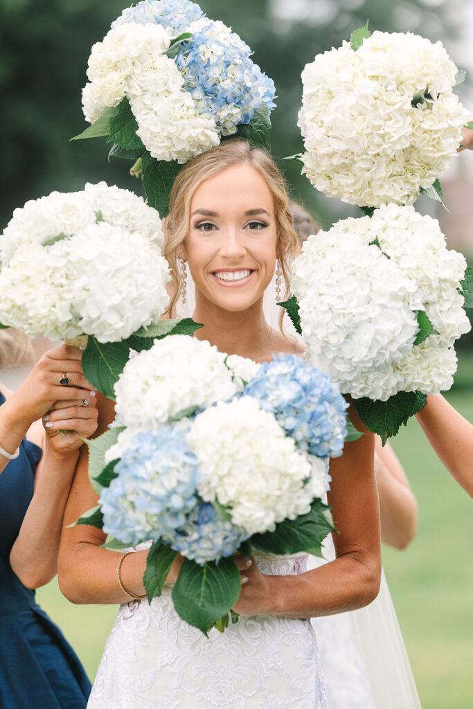 Columbia South Carolina Photographer | 701 Whaley Wedding|  bride surrounded by bouquets from something special florals