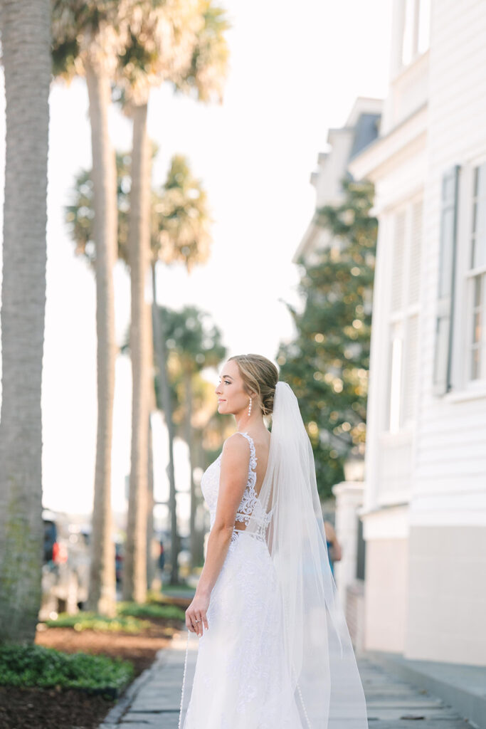 bridal portraits in Charleston | Bride looking out to the water 