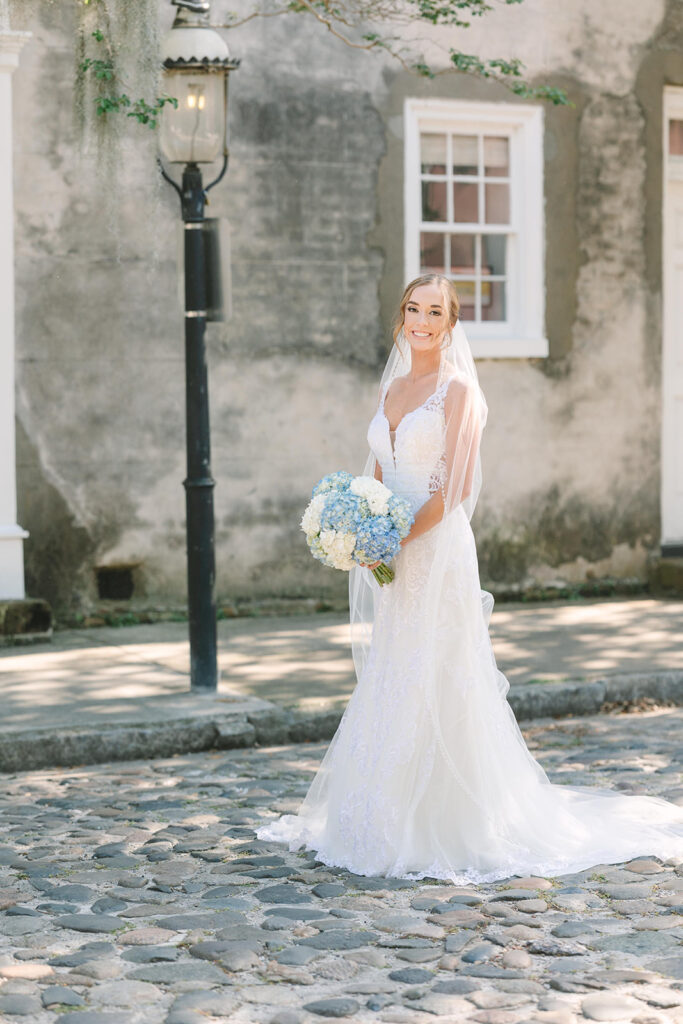 Charleston bridal portrait locations  bride in charleston on cobblestone street