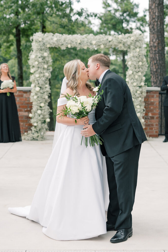 Heron Hill Wedding Venue | Gilbert SC | Chad and Kendall's wedding | couple kissing after saying vows