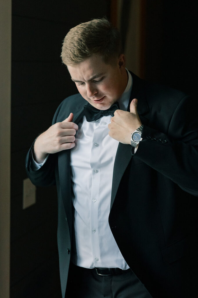 Heron Hill Wedding Venue | Gilbert SC | Chad and Kendall's wedding | groom putting on jacket