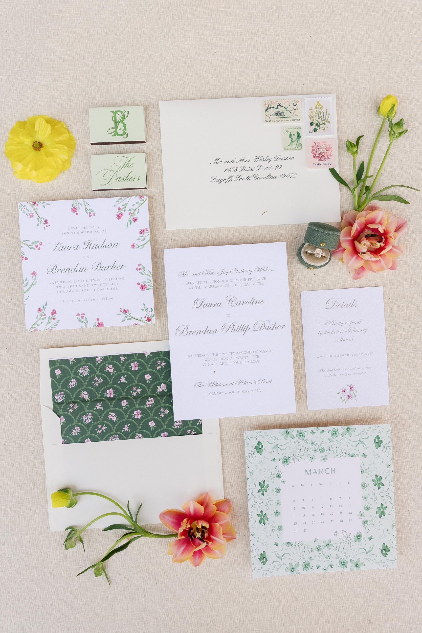 Wedding Planning in Columbia SC | Stee Garman Photography Fine-art Wedding Photographer | An elegant wedding invitation suite on a beige surface, featuring floral patterns and pastel colors. Includes invitation, details card, and calendar. Yellow and pink flowers are placed decoratively, alongside vintage stamps and a green velvet ribbon.