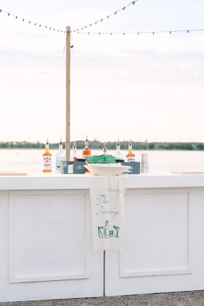Waterfront wedding bar with signature cocktails and river views at The Island House Charleston